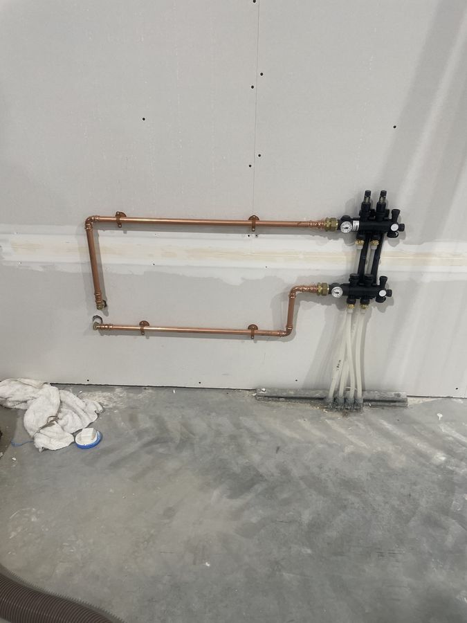 Radiant Floor Heat Manifold Installation